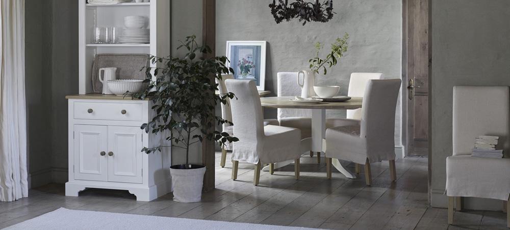 Long Island dining chairs with natural loose covers by Neptune